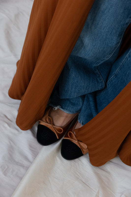 the matte lines abaya - burnt orange