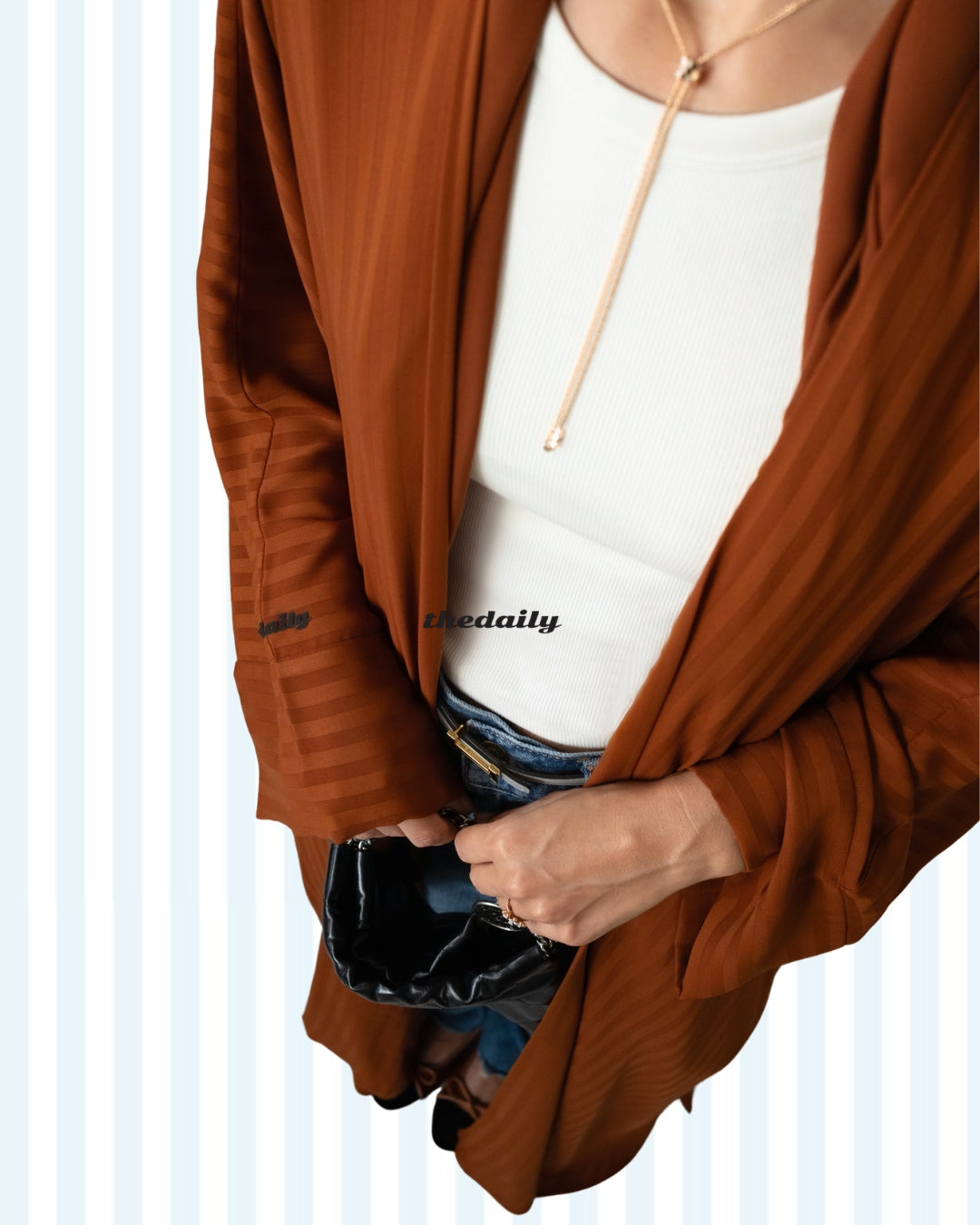 the matte lines abaya - burnt orange